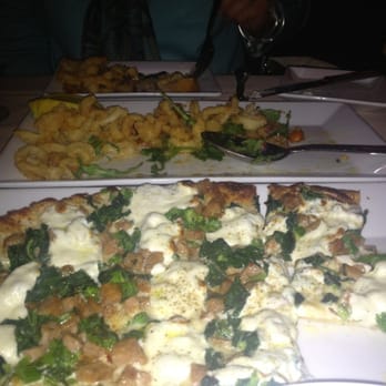 Antonio's Trattoria - Delicious fried calamari in the background. - Italian Near Me - Cranston, Rhode Island Antonio's Trattoria - Delicious fried calamari in the background. - Italian Near Me - Cranston, Rhode Island