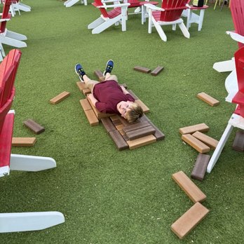 Chicken N Pickle- Grapevine - Grandson made a 'boat bed' with the huge jenga blocks. - New American Near Me - Grapevine, Texas Chicken N Pickle- Grapevine - Grandson made a 'boat bed' with the huge jenga blocks. - New American Near Me - Grapevine, Texas