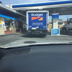 Arco - Trucks taking the gas station pumps as a parking spot.