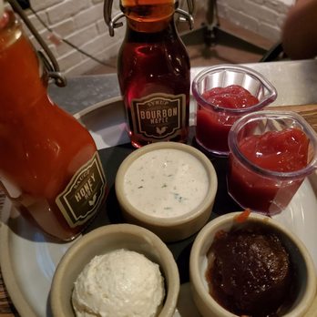Yardbird - Side condiments. Must have the hot sauce. - Southern Near Me - Las Vegas, Nevada Yardbird - Side condiments. Must have the hot sauce. - Southern Near Me - Las Vegas, Nevada