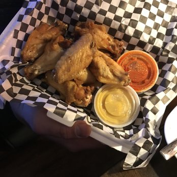 The Off Track Saloon - Wings with hot sauce and honey mustard - Delis Near Me - Saint Louis, Missouri The Off Track Saloon - Wings with hot sauce and honey mustard - Delis Near Me - Saint Louis, Missouri