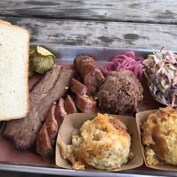 Truth BBQ - Amazing BBQ. Probably one of the best I had. 1/4 pull pork, 1/4 moist Sliced Brisket, and 1/4 sausage. Tots casserole, corn pudding, slaw - Barbeque Near Me - Brenham, Texas