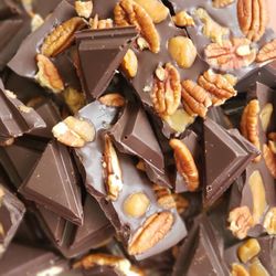Creative Candies & Things - Pecan Caramel Bark.  Milk Chocolate with Caramel Nibs & Pecans.