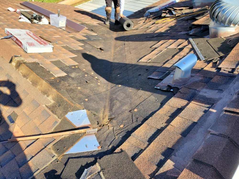 Slide of Berber-Bravo Roofing