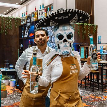 Envision Studios - Brand character and bartender showcasing signature drinks for Santo Gusano at the WSWA Convention & Exposition - Videographers Near Me Envision Studios - Brand character and bartender showcasing signature drinks for Santo Gusano at the WSWA Convention & Exposition - Videographers Near Me