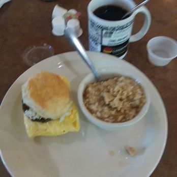 Wanda's Restaurant - My breakfast at Wanda's. Bacon egg and cheese biscuit, coffee, and side of oatmeal all for just over $4. Great Value and friendly service - New American Near Me - Rock Spring, Georgia