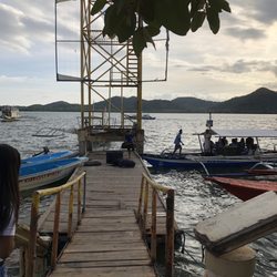 Discovery Island Resort & Dive Center - Coron town docks.  Meeting our boat (far right).