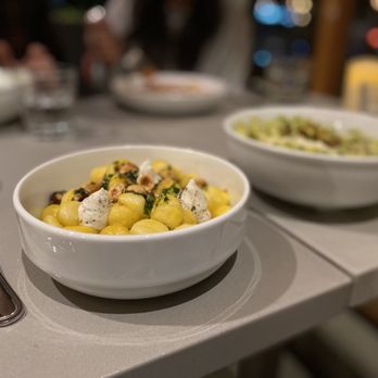 Tavolàta Fremont - two bowls of food on a table - Italian Near Me - Seattle, Washington Tavolàta Fremont - two bowls of food on a table - Italian Near Me - Seattle, Washington