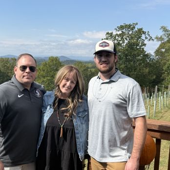 Dahlonega Wine Tours - Picture with my husband & oldest son at Wolf Mountain - Wine Tours Near Me - Dahlonega, Georgia