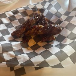 1492 On The Square - Fried ribs were finger lickin good The menu contains food for all food choices.