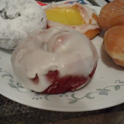 Powdered donut, red velvet donut, lemon danish, and glazed twist donut.
