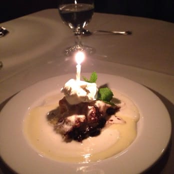 Craig's - Bread pudding with a b -day candle - American Near Me - West Hollywood, California