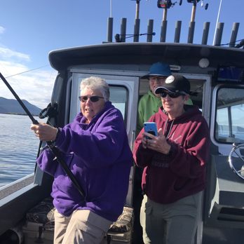 Stout Fish - Barb and Patti working on reeling in a shark! - Fishing Near Me