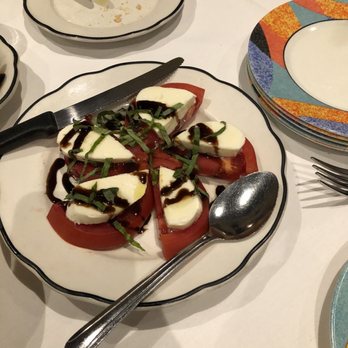 Forlini's Restaurant - a plate of food on a table - Italian Near Me - Clearwater Beach, Florida Forlini's Restaurant - a plate of food on a table - Italian Near Me - Clearwater Beach, Florida