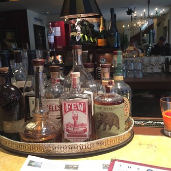 The Globe - Love the art on intriguing bottles of booze, sitting smartly in a silver tray - New American Near Me - Coral Gables, Florida The Globe - Love the art on intriguing bottles of booze, sitting smartly in a silver tray - New American Near Me - Coral Gables, Florida
