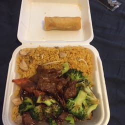 Canton Restaurant - Beef and broccoli with a spring roll and chicken fried rice.