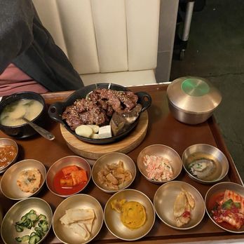 Kunjip Tofu - Side dish and tofu seaweed soup with grilled Wagyu Galbi. A big rib bone was underneath - Korean Near Me - Mountain View, California Kunjip Tofu - Side dish and tofu seaweed soup with grilled Wagyu Galbi. A big rib bone was underneath - Korean Near Me - Mountain View, California