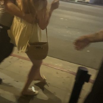 The Den on Sunset - My friend being grabbed and being pushed into the street after trying to get the bouncers hand off my neck. - American Near Me - West Hollywood, California