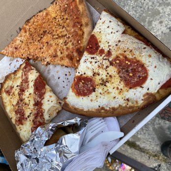 Apicius - two slices of pizza in a box - Italian Near Me - Astoria, New York Apicius - two slices of pizza in a box - Italian Near Me - Astoria, New York