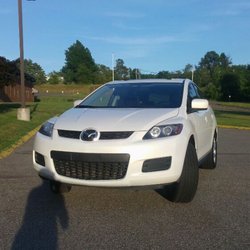 Gemini Car Rentals - Mazda Cx-7 crispy pearl white going for rent Midsize SUV - Gemini Car Rentals LLC