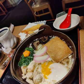 Tenjin - Nabayaki udon. Udon noodles with chicken egg spinach and inari. - Sushi Bars Near Me - Lincolnwood, Illinois Tenjin - Nabayaki udon. Udon noodles with chicken egg spinach and inari. - Sushi Bars Near Me - Lincolnwood, Illinois