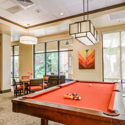 The Plaza at Pearl City - Resident billiards and recreation room at The Plaza at Pearl City assisted living and senior living community in Pearl City, Oahu.