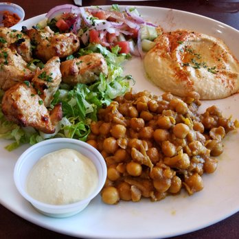Baba Ganoush Mediterranean Grill - Chicken Kabob with a side of hummus and a side of curried chick peas. - Mediterranean Near Me - Fredericksburg, Virginia Baba Ganoush Mediterranean Grill - Chicken Kabob with a side of hummus and a side of curried chick peas. - Mediterranean Near Me - Fredericksburg, Virginia