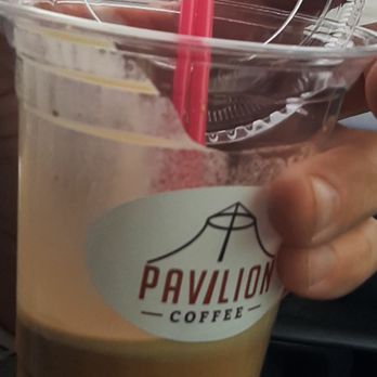 Pavilion Coffee - a person holding a cup of coffee - Coffee & Tea Near Me - Spokane Valley, Washington Pavilion Coffee - a person holding a cup of coffee - Coffee & Tea Near Me - Spokane Valley, Washington