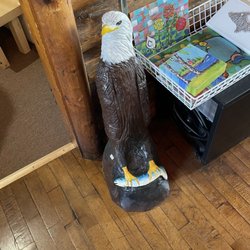 Keweenaw Handicraft Shop - Inside pic of store.  Wood Carving.