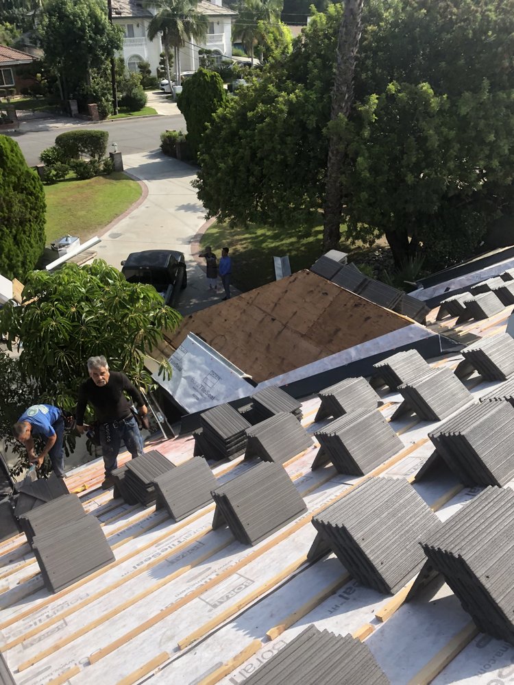 Slide of Top Elite Roofing