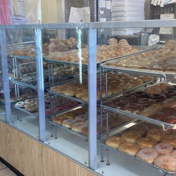 Jelly Donut - Bakery Case With Donuts - Donuts Near Me - Indio, California Jelly Donut - Bakery Case With Donuts - Donuts Near Me - Indio, California