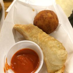 Empanada and beef stuffed potatoes