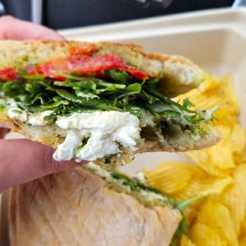 The Vintage LBC - The Caprese ~ Fresh burrata, pesto, lemony vinegrette greens, roasted tomatoes - Cheese Shops Near Me - Long Beach, California