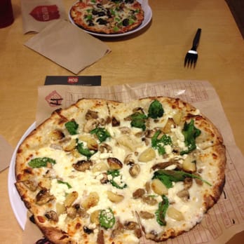 MOD Pizza - MOD size and Mini in the background! I ate half the MOD and have leftovers for today! - Pizza Near Me - Goodyear, Arizona MOD Pizza - MOD size and Mini in the background! I ate half the MOD and have leftovers for today! - Pizza Near Me - Goodyear, Arizona
