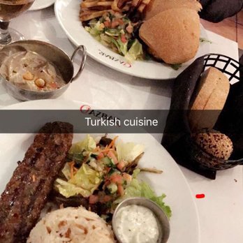 Cazbar - Hummus to die for. Lamb kebob (underneath words) salmon sandwich (above words) - Turkish Near Me - Baltimore, Maryland Cazbar - Hummus to die for. Lamb kebob (underneath words) salmon sandwich (above words) - Turkish Near Me - Baltimore, Maryland