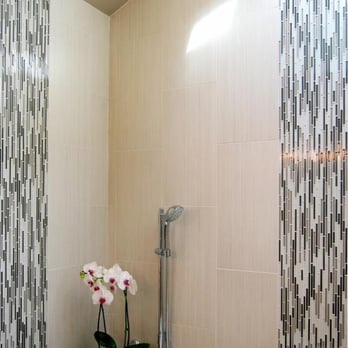 Metropolitan Repairs - a shower with a flower in a vase - Plumbing Near Me - Potomac Falls, Virginia Metropolitan Repairs - a shower with a flower in a vase - Plumbing Near Me - Potomac Falls, Virginia