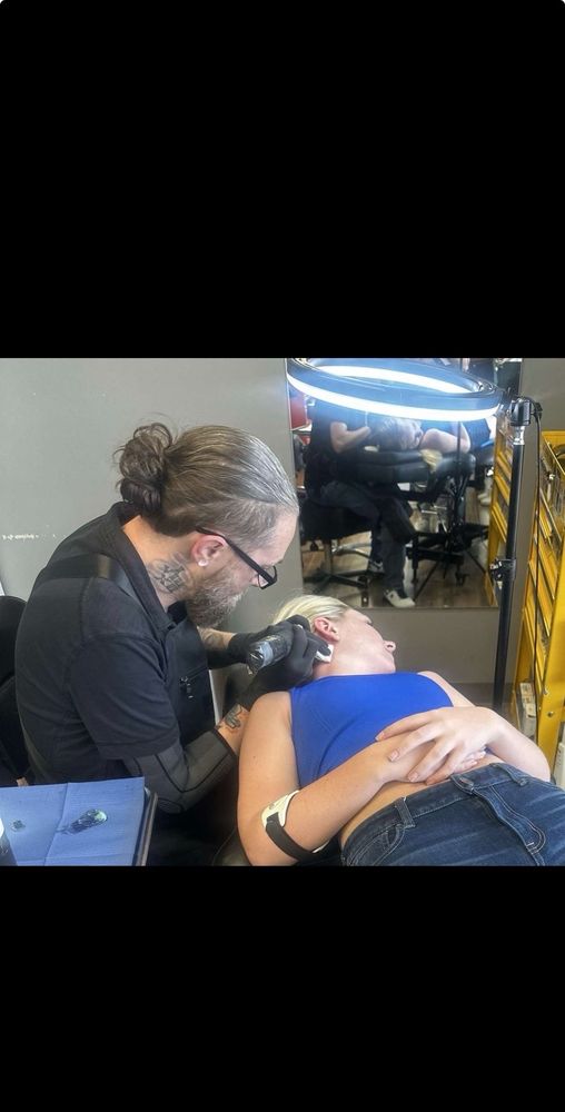 Abandon All Hope Tattoo and Body Piercing Logo