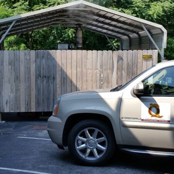 Bobby Q's - a car parked in a parking lot - Barbeque Near Me - Cookeville, Tennessee