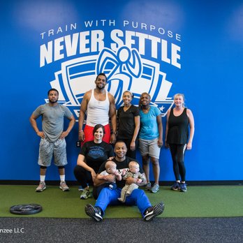 Never Settle Fitness - Posing for a picture after our family-friendly team training class. - Trainers Near Me - Indianapolis, Indiana Never Settle Fitness - Posing for a picture after our family-friendly team training class. - Trainers Near Me - Indianapolis, Indiana