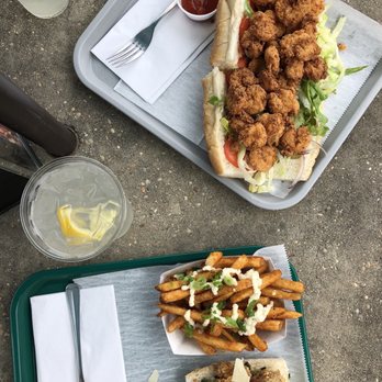 The Rougaroux - Shrimp poboy, fries, and a half oysters rockefeller poboy - Cajun/Creole Near Me - Birmingham, Alabama