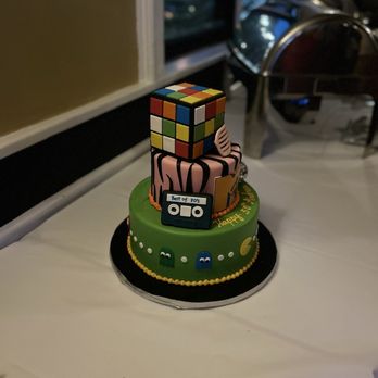Creative Cakes - Amazing vanilla cake with lemon curd filling. It was so delicious and moist! The 80s designs were incredible. Highly recommend - Bakeries Near Me - Silver Spring, Maryland