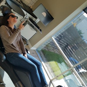 Dental House - TVs on the ceilings as a fun distraction during your visits. Glasses assist with TV volume and lighting. So relaxing! - Cosmetic Dentists Near Me - Irvine, California