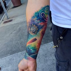 Divine Moment Tattooing