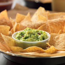 QDOBA Mexican Eats - Hand-smashed-in-house-daily guacamole is best served with freshly fried in-house tortilla chips.