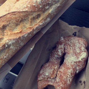 Clafoutis - Beignet, mini chicken salad sandwich, and a baguette - French Near Me - Santa Fe, New Mexico