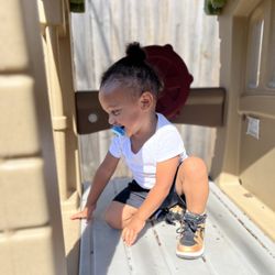 Little Cubs Learn and Play Daycare - Outside time always always great for the muscles . Let's play on the slide .