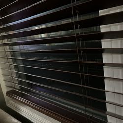 Window Happenings - Curvature in the blind is quite noticeable as seen in the photo.