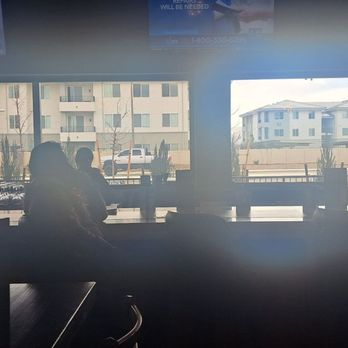 The Brass Tap - The view inside facing Steamboat Pkwy - Sports Bars Near Me - Reno, Nevada The Brass Tap - The view inside facing Steamboat Pkwy - Sports Bars Near Me - Reno, Nevada