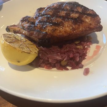 Seasons 52 - Grilled pork chop on a bed of red cabbage - New American Near Me - Schaumburg, Illinois