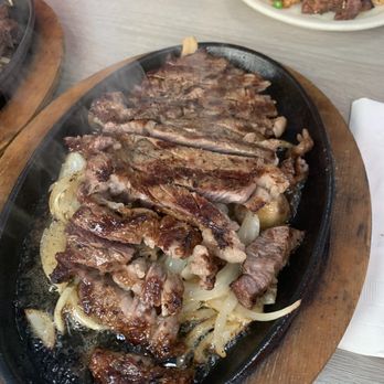 Side Street Inn - 12 Oz . Sizzling Rib Eye Steak - Sports Bars Near Me - Honolulu, Hawaii Side Street Inn - 12 Oz . Sizzling Rib Eye Steak - Sports Bars Near Me - Honolulu, Hawaii